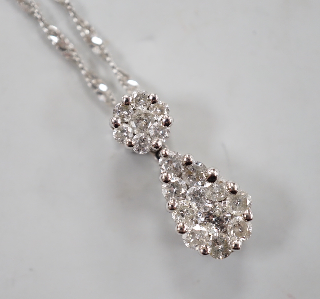 A modern 14kt white metal and pave set diamond set pear shaped pendant necklace, 52cm, gross weight 4.2 grams.